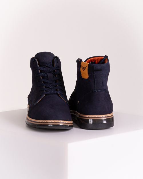 Calzado en bota azul para hombre